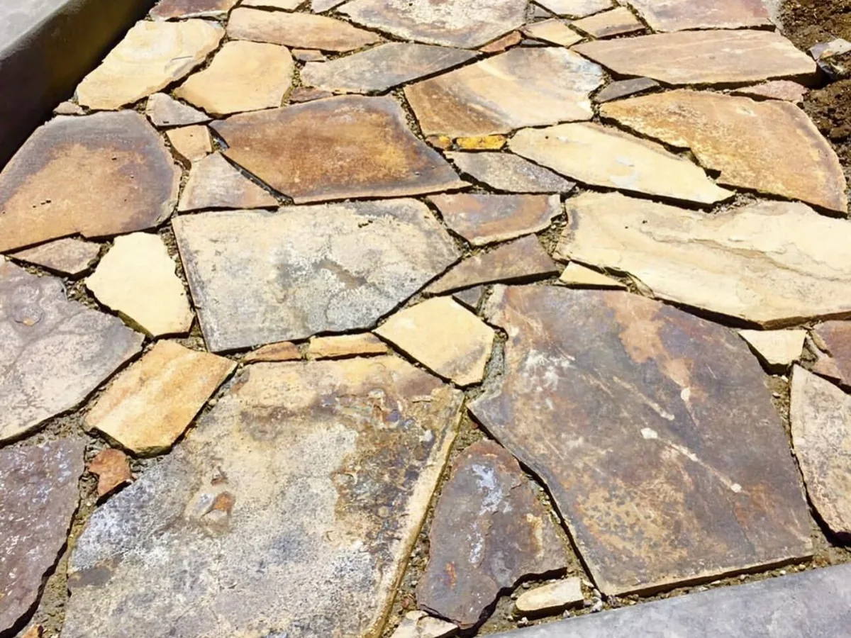 Close view of dry-laid flagstone with tight hand-cut joints